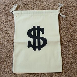 Canvas money sign bag measures at 15" x 10.5". NWOT